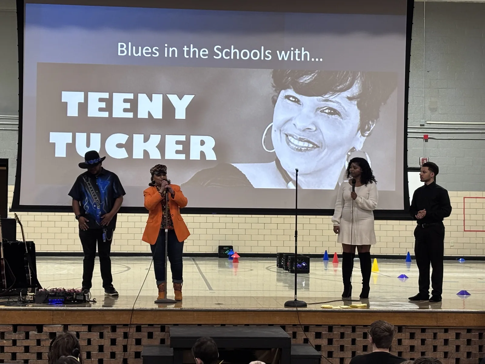 Blues in the Schools performers on stage with Teeny Tucker