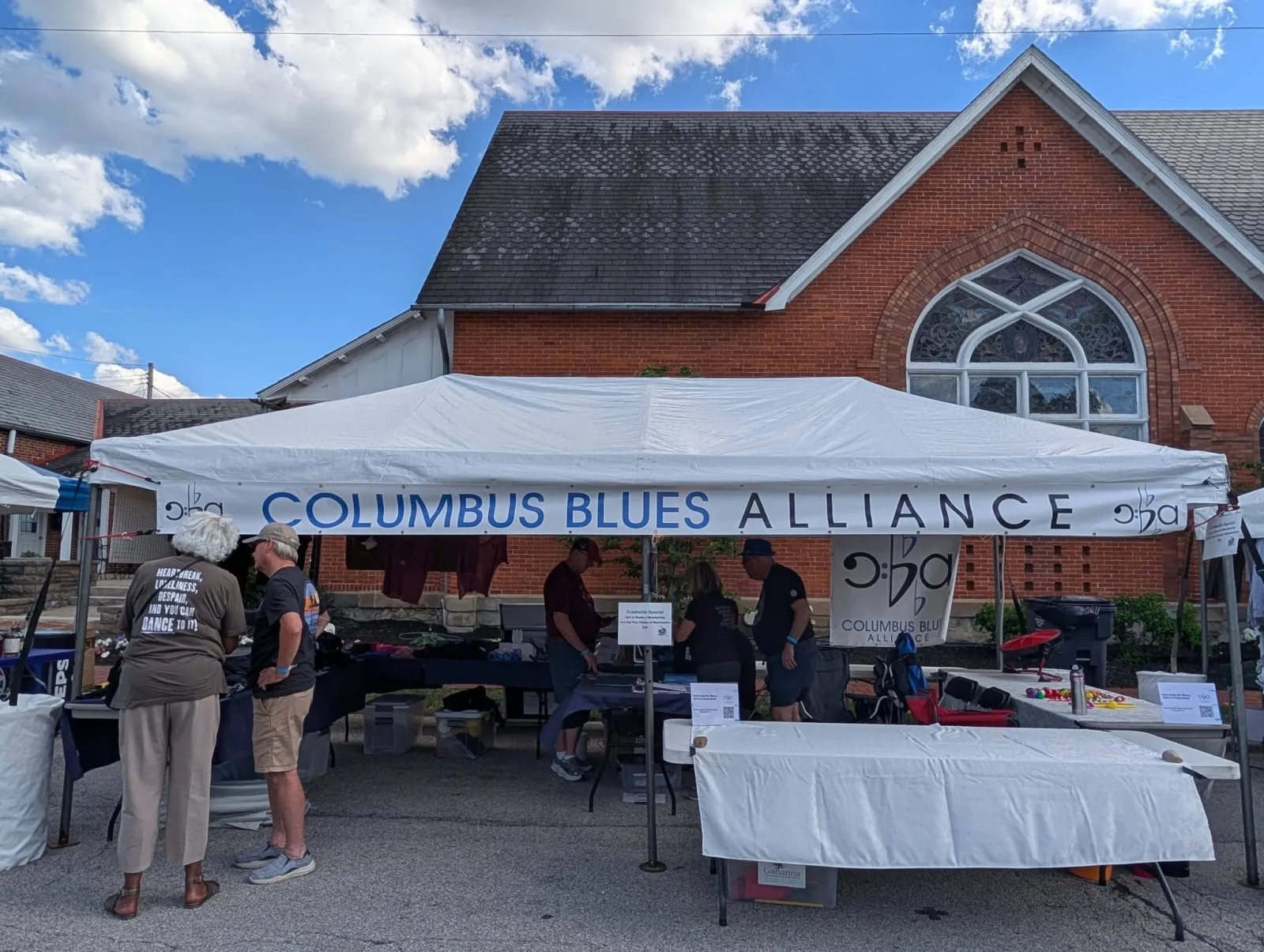 Columbus Blues Alliance volunteers at the community festival tent